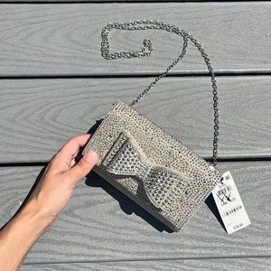 INC silver studded bow clutch